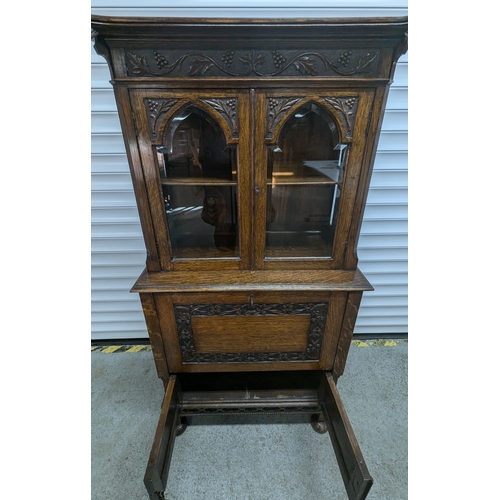 1325 - A Carved Oak Secretaire