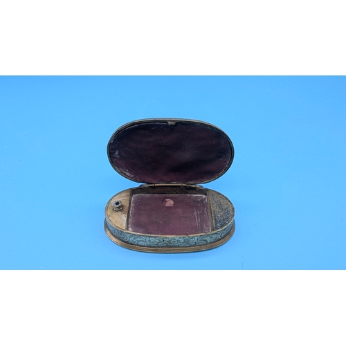 215 - An Ornate Brass Table Snuff Box