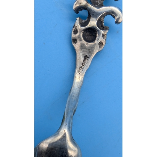 217 - An Ornate Caddy Spoon and Salt Spoon