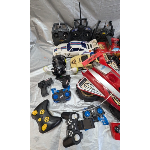 1601 - Large Quantity of Mixed Remote Control Cars, Toys & remote controls