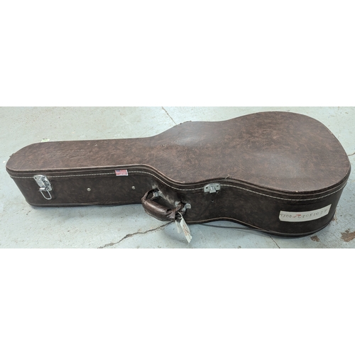 194 - A Gould Electric Guitar In Brown Leatherette Hard Case