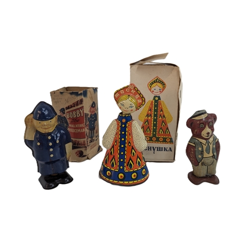 1003 - Vintage Tin Clockwork Toys, Bobby The Walking Policeman, A Soviet Matryoshka Doll and Wells Brimtoy ... 