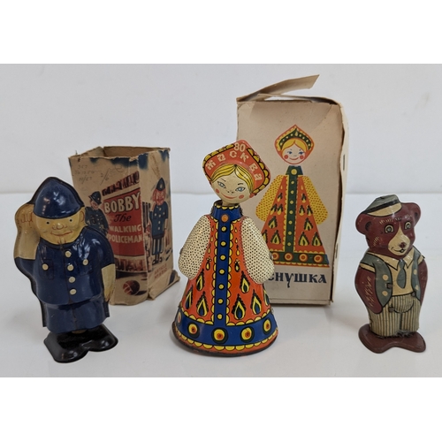 1003 - Vintage Tin Clockwork Toys, Bobby The Walking Policeman, A Soviet Matryoshka Doll and Wells Brimtoy ... 