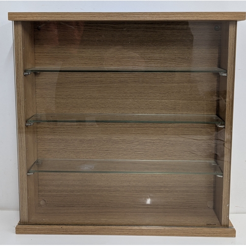 1020 - A Wall Hanging Display Cabinet With Tempered Glass Sliding Door And Shelves - 52 x 55cm