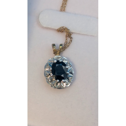 240 - A 9ct Gold Sapphire And Diamond Pendant