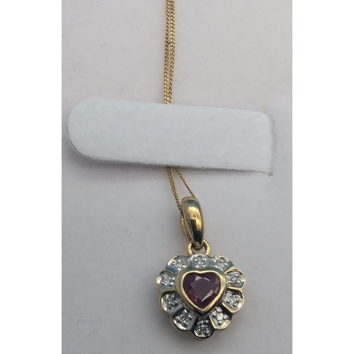 242 - A 9ct Gold Heart Shaped Ruby Necklace Surrounded By Diamonds