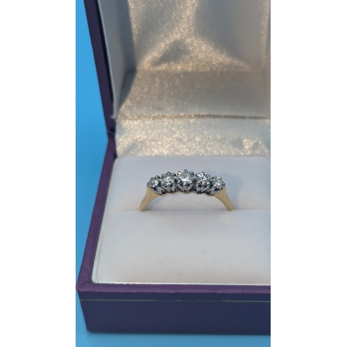 313 - An 18ct Yellow Gold 5 Stone Diamond Ring In A Platinum Setting