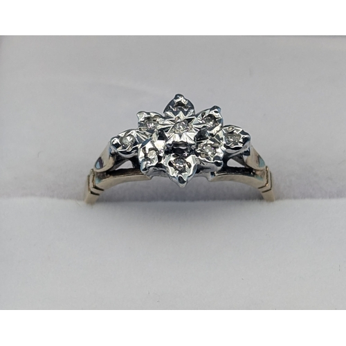 323 - A 9ct Gold And Diamond Cluster Ring