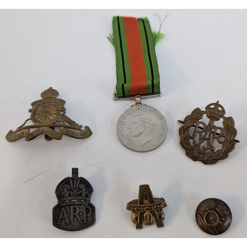 564 - A WW2 Silver ARP Wardens Badge, Defence Medal, RAF and Royal Artillary Badges etc.