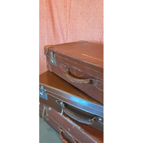 2411 - A Collection of 4 x Vintage Leather Suitcases