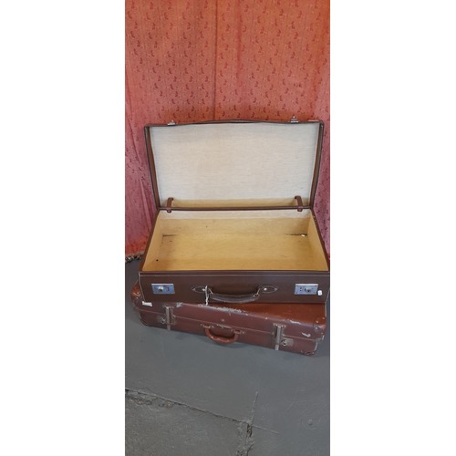 2411 - A Collection of 4 x Vintage Leather Suitcases