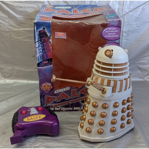 1597 - Boxed Remote Control Dalek And One Small Dalek