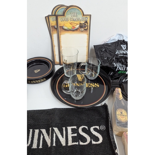 619 - A Box of Guinness Collectables and Breweriana including Scarf, Ashtrays, Beer Mats and Towels etc