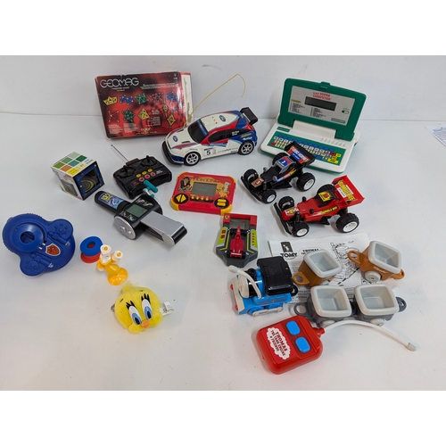 1645 - A Remote Control Thomas The Tank Engine and Other Electronic Games and Toys - In Storage Trunk