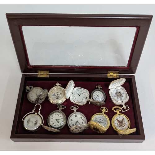 690 - A Display Case with 10 Pocket Watches