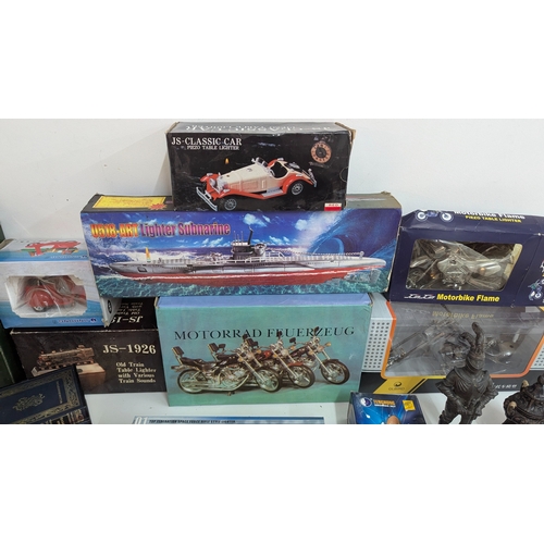 693 - A Large Quantity of Novelty Lighters inc. Submarine, Motor Bikes, Cannon etc.