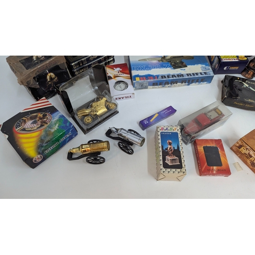 693 - A Large Quantity of Novelty Lighters inc. Submarine, Motor Bikes, Cannon etc.