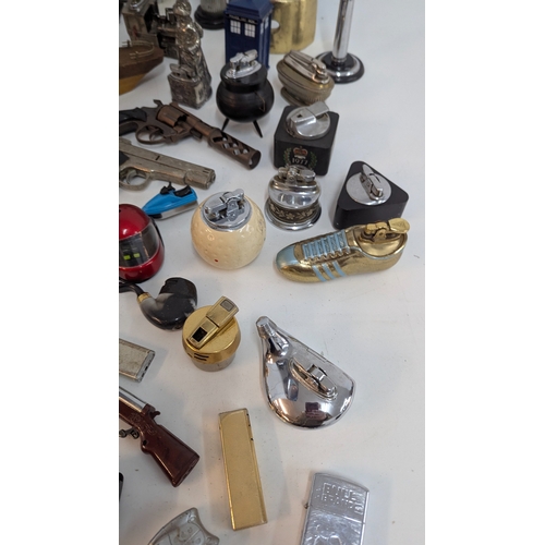 694 - A Large Quantity of Novelty Cigarette Lighters inc. Pistols, Eiffel Tower etc.