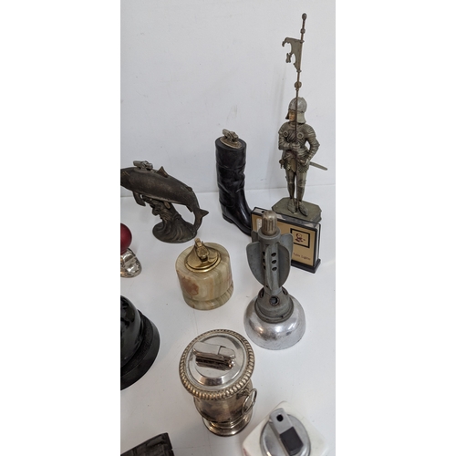 695 - A Large Quantity of Novelty Cigarette Lighters Inc . Tank, Locomotive and Knight etc.