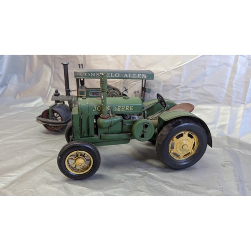 817 - Tin Plate Models Of A John Deere 1931GP And A Steam Roller With Consuelo Allen