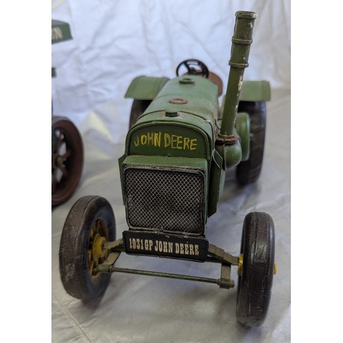 817 - Tin Plate Models Of A John Deere 1931GP And A Steam Roller With Consuelo Allen