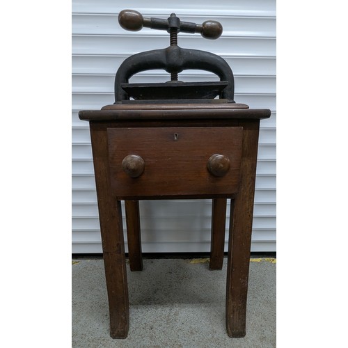 905 - Small Iron Book Press On Wooden Stand With One Drawer - 105 x 50 x 40cm