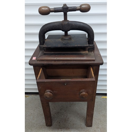 905 - Small Iron Book Press On Wooden Stand With One Drawer - 105 x 50 x 40cm