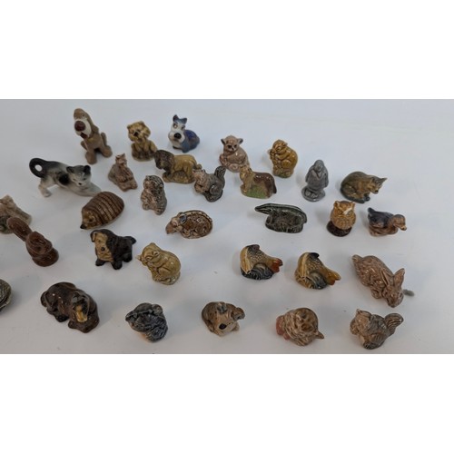 118 - A Collection of Wade Whimsies and Other Beatrix Potter Metal Figurines