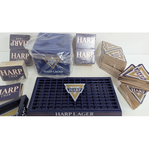 601 - A Collection of Harp Lager Meer Mats and other Breweriana