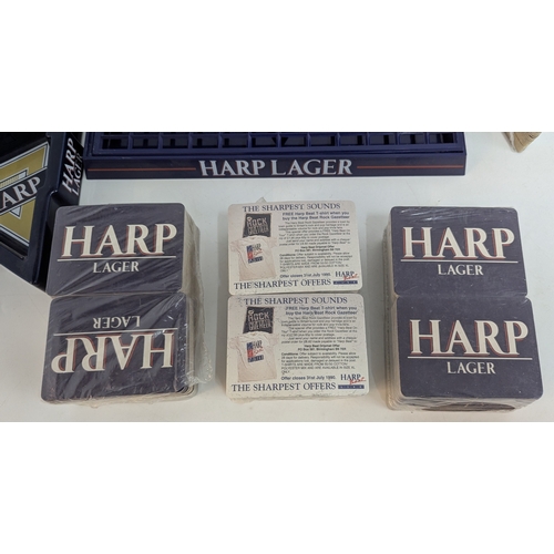 601 - A Collection of Harp Lager Meer Mats and other Breweriana