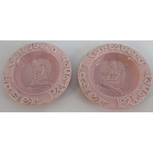 634 - A Pair Of Carlsberg Pilsner Pink Lady Ashtrays