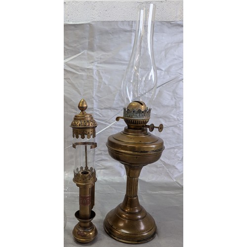 812 - A Brass Oil Lamp, Brass Wall Lamps, And Spare Chimney