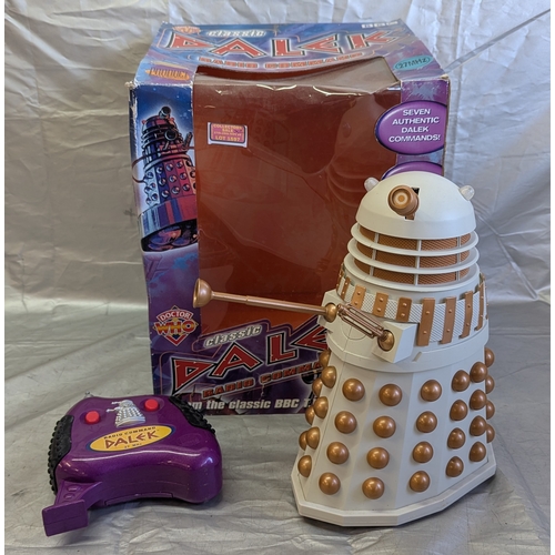 1597 - Boxed Remote Control Dalek And One Small Dalek