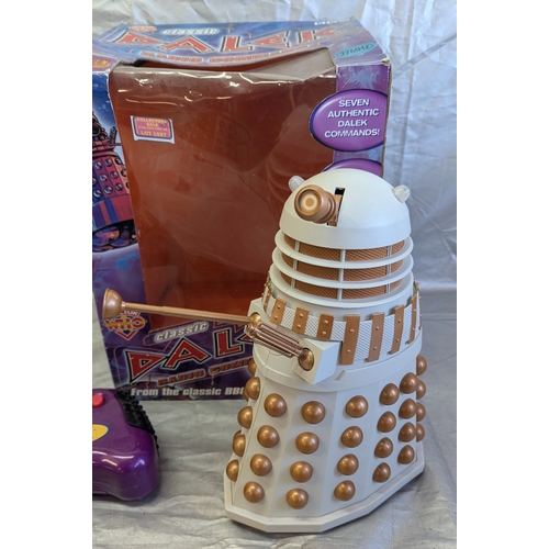 1597 - Boxed Remote Control Dalek And One Small Dalek