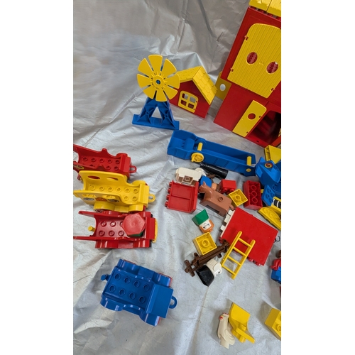 1711 - Selection Of Lego Duplo Including Buildings, Vehicles, Figures And Animals 2-5kg Approximately