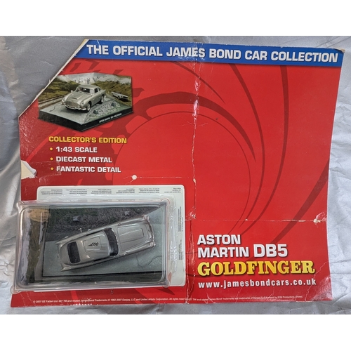 1838 - 2 James Bond Unopened Carded Cars And One Unopened Cased Car With Backing Board Including - Corgi Yo... 