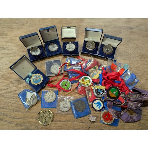 269E - An assortment of Athletics and swimming medals and awards