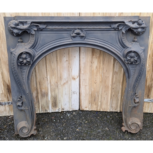 1E - An Ornate Cast Iron Fire Surround And Plates - 120 x 130 x 20cm