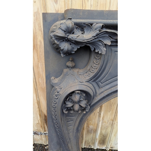 1E - An Ornate Cast Iron Fire Surround And Plates - 120 x 130 x 20cm