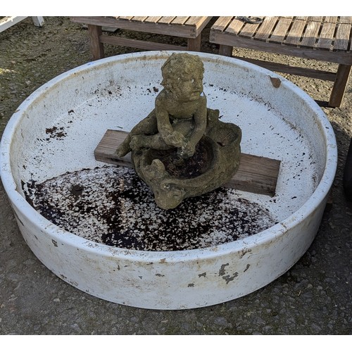 11B - A Garden Water Feature - A Cherub Ornament -( 50 x 40 x 55cm) and sunken porcelain base - 121cm Diam... 