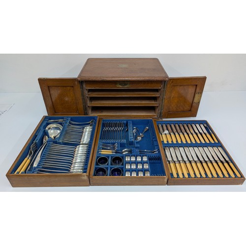 37 - An Oak and Brass Cased 4 Drawer Canteen of Cutlery 54 x 34 x 42cm