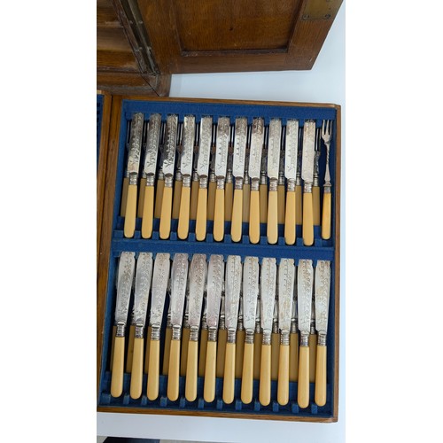 37 - An Oak and Brass Cased 4 Drawer Canteen of Cutlery 54 x 34 x 42cm