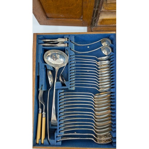 37 - An Oak and Brass Cased 4 Drawer Canteen of Cutlery 54 x 34 x 42cm