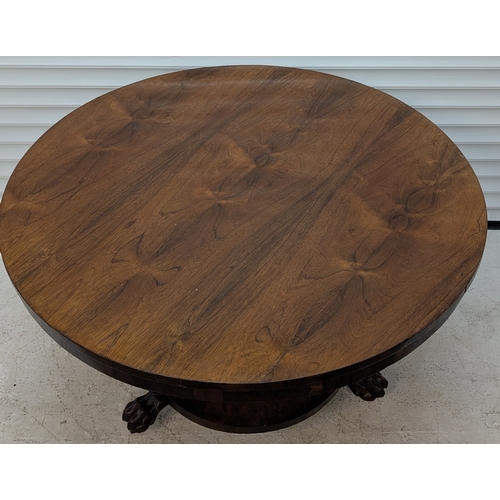 37 - Antique Tilt Top Table On Tapered Centre Column, Claw Feet And Brass Castors - 74 x 121 x 121cm