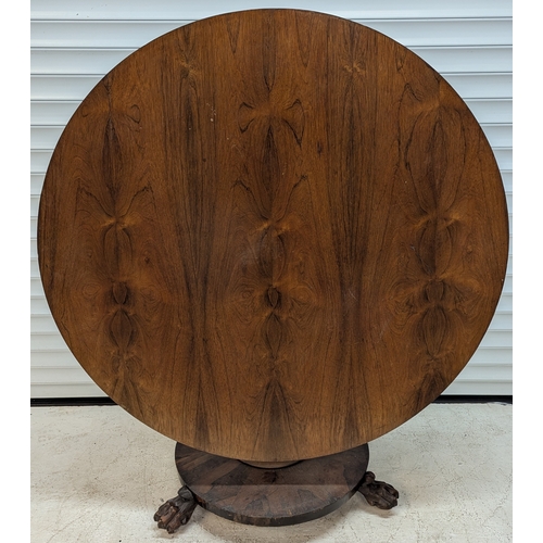 37 - Antique Tilt Top Table On Tapered Centre Column, Claw Feet And Brass Castors - 74 x 121 x 121cm