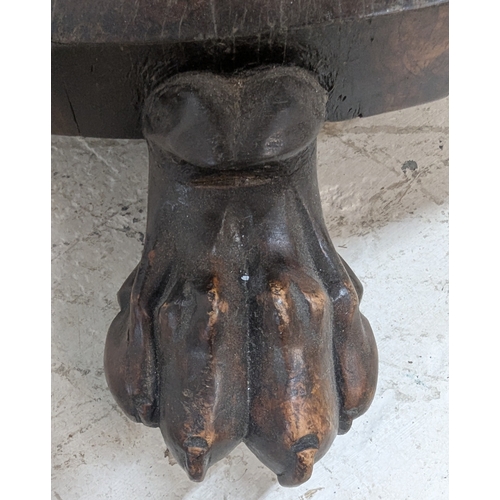 37 - Antique Tilt Top Table On Tapered Centre Column, Claw Feet And Brass Castors - 74 x 121 x 121cm
