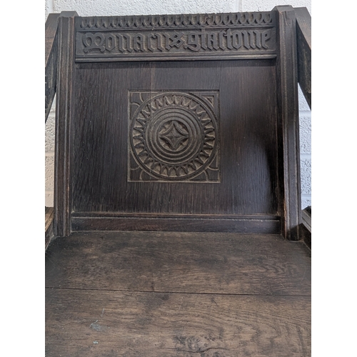 38 - Antique Dark Oak Church Clergy Glastonbury Chair With Ornate Carving - 86 x 74 x 60cm