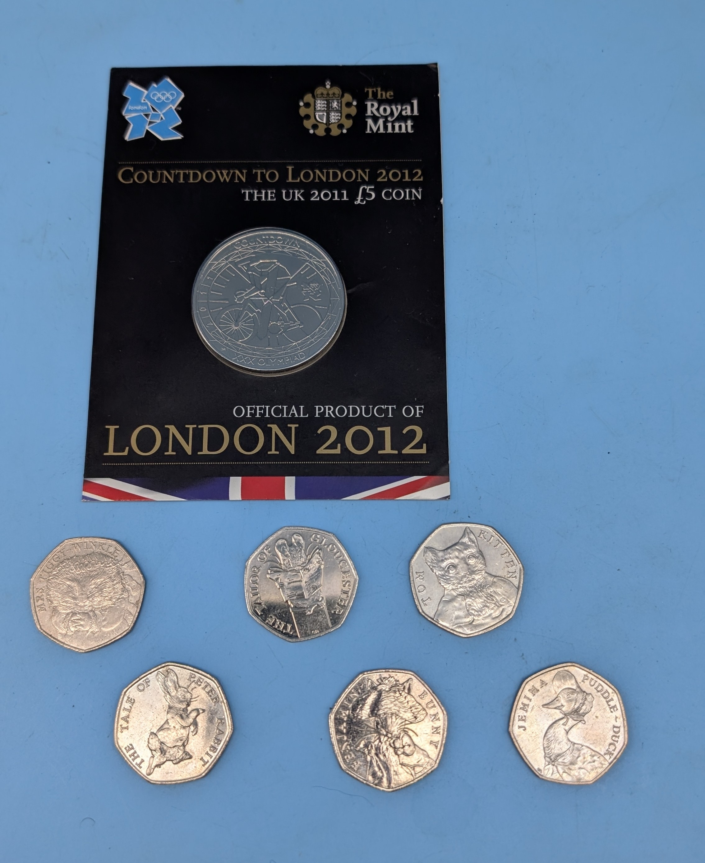 A small collection of Royal Mint commemorative coins, including a 2011 ...