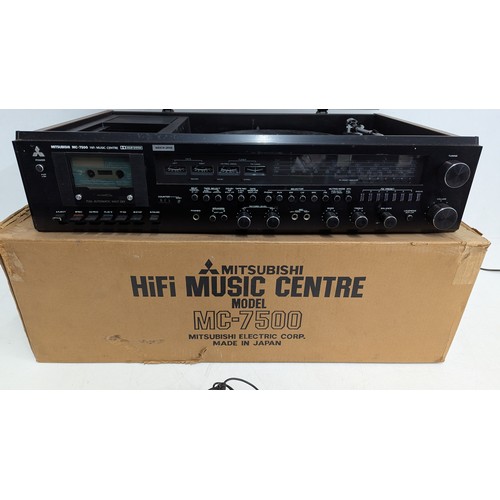 2049B - A MITSUBISHI HI-FI MUSIC CENTRE, MODEL MC-7500 WITH SPEAKERS
A 1970s Japanese-made stereo music syst... 