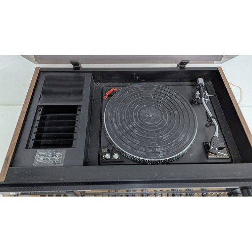 2049B - A MITSUBISHI HI-FI MUSIC CENTRE, MODEL MC-7500 WITH SPEAKERS
A 1970s Japanese-made stereo music syst... 